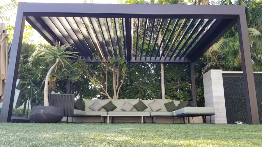 Open shutters on the roof of a custom shading structure, designed by Skyco.