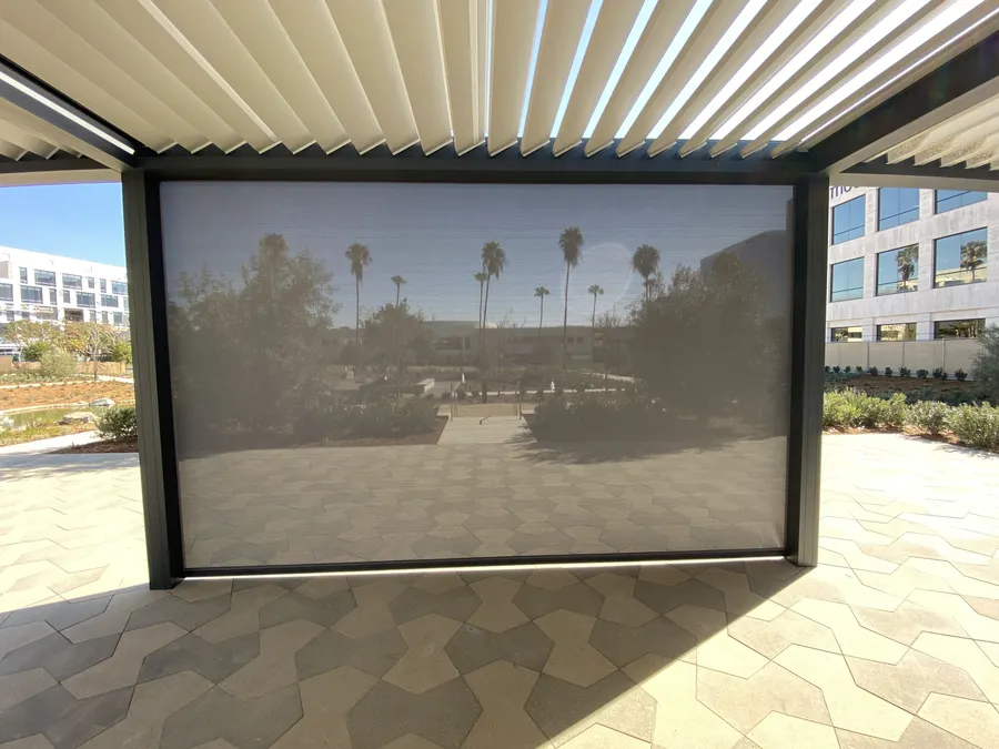 Fully-lowered, semi-transparent roller shade to provide privacy and shade.